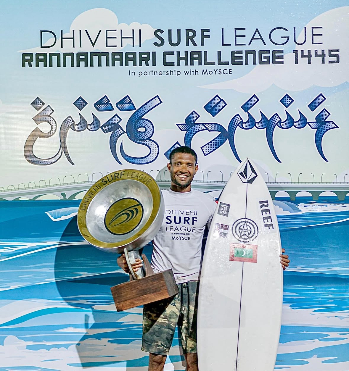 Hussain Areef Iboo with Dhivehi Surf League championship trophy